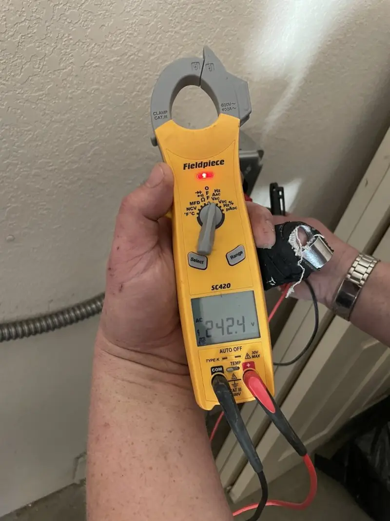 Voltage testing with clamp meter during Hot Tub / Pool Electrical Wiring in Sierra Ridge